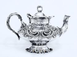 1867 Meriden B Company Quadruple Aesthetic Embossed Rococo Chased Chalet Teapot