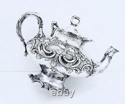 1867 Meriden B Company Quadruple Aesthetic Embossed Rococo Chased Chalet Teapot