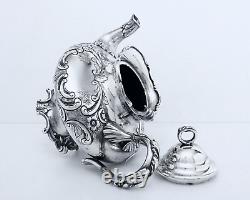 1867 Meriden B Company Quadruple Aesthetic Embossed Rococo Chased Chalet Teapot