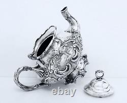 1867 Meriden B Company Quadruple Aesthetic Embossed Rococo Chased Chalet Teapot