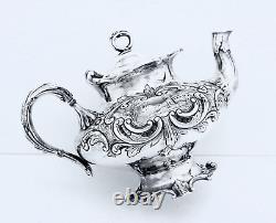 1867 Meriden B Company Quadruple Aesthetic Embossed Rococo Chased Chalet Teapot