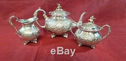 A Victorian Silver Plated Tea Set With Respoused Patterns. Bird Finials. J. Turton