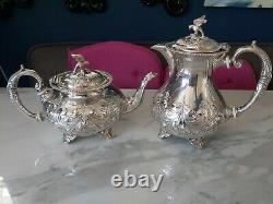 An Antique Silver Plated Bird Finial Tea Set. Embossed Patterns. J. Turton & co