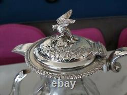 An Antique Silver Plated Bird Finial Tea Set. Embossed Patterns. J. Turton & co