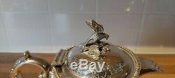 An Antique Silver Plated Tea Set With Embossed Patterns. Eagle Finials. J. Turton