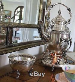 Antique 1920s vintage tilting teapot, silver plate over copper tea set