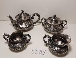 Antique QUADRUPLE REPOUSSE 4 Piece TEA/COFFEE SET Wilcox SILVERPLATE