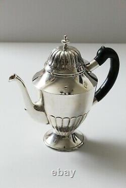 Colonial style Sterling Sliver plate tea pot from prominent estate