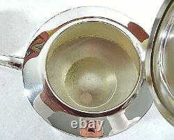 English Art Deco Silver Plate Teaset Sold by Kirby and Beard & Co, Paris, France