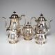 Five Piece Antique Crescent Silver-plate Hand Chased Coffee & Tea Set Read