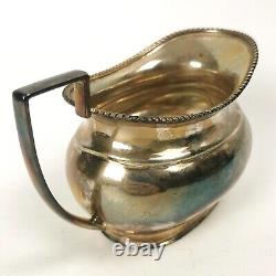 Four Piece Antique Silver Plate Tea & Coffee Set Ebonised Handle Reeded Design