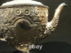 GORGEOUS 3-PC AMERICAN SILVER PLATE CHASED DECORATED TEA SET, c. 1890's