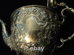 GORGEOUS 3-PC AMERICAN SILVER PLATE CHASED DECORATED TEA SET, c. 1890's