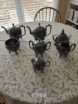 Seven Piece Antique Figural Clawfoot Silver Plate Tea Set