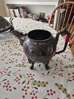 Seven Piece Antique Figural Clawfoot Silver Plate Tea Set