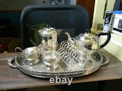 Silver plated tea set on oval tray including 7 items