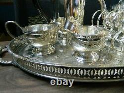 Silver plated tea set on oval tray including 7 items