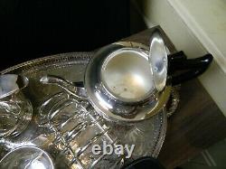 Silver plated tea set on oval tray including 7 items