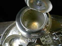 Silver plated tea set on oval tray including 7 items