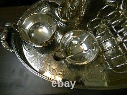 Silver plated tea set on oval tray including 7 items