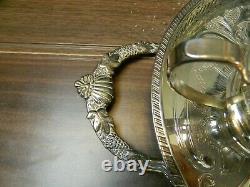 Silver plated tea set on oval tray including 7 items