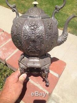 Tea Pot Silver Plate On Stand Very Ornate faces People Antique RARE