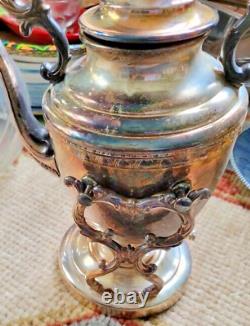 VICTORIAN SILVER ON COPPER TILTING TEA POT and warmer