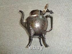 Victorian silver plate tea pot four scroll feet curved spout etched lowers deer